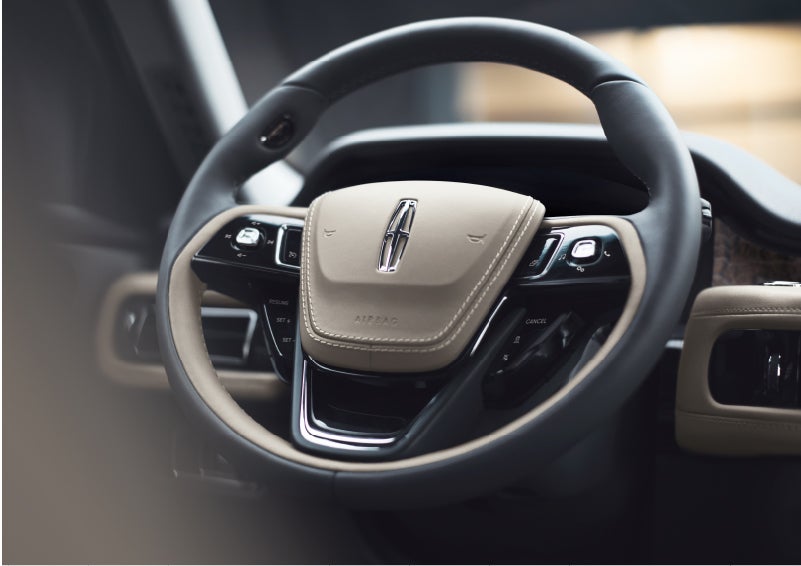 The intuitively placed controls of the steering wheel on a 2023 Lincoln Aviator® SUV | All Star Lincoln in Prairieville LA