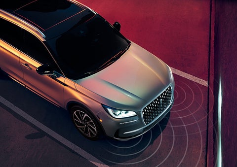 Illustrated radar signals are shown emitting from the front of a 2023 Lincoln Corsair® SUV. | All Star Lincoln in Prairieville LA