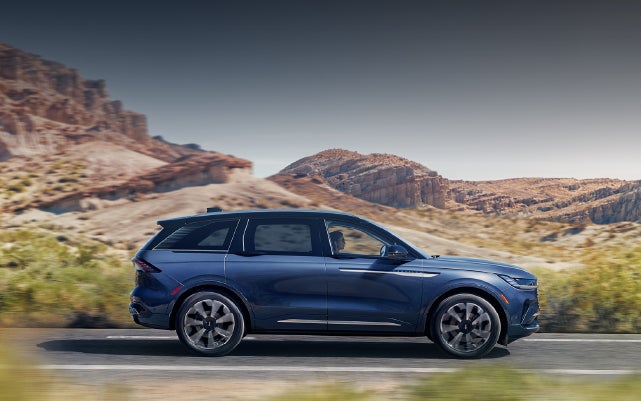 A 2024 Lincoln Nautilus® SUV is being driven in a desert setting. | All Star Lincoln in Prairieville LA