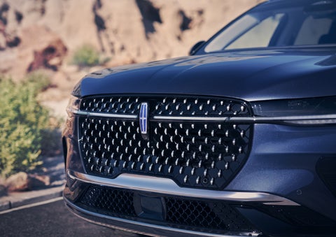 The stylish grille of a 2024 Lincoln Nautilus® SUV sparkles in the sunlight. | All Star Lincoln in Prairieville LA